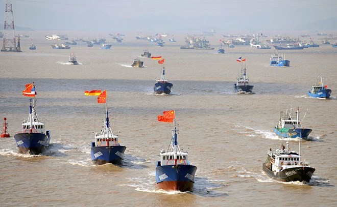 China accused of using navy to intimidate fishing vessels in East Sea - ảnh 1